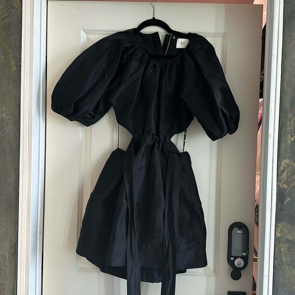 Perfect black dress for a day and night time.